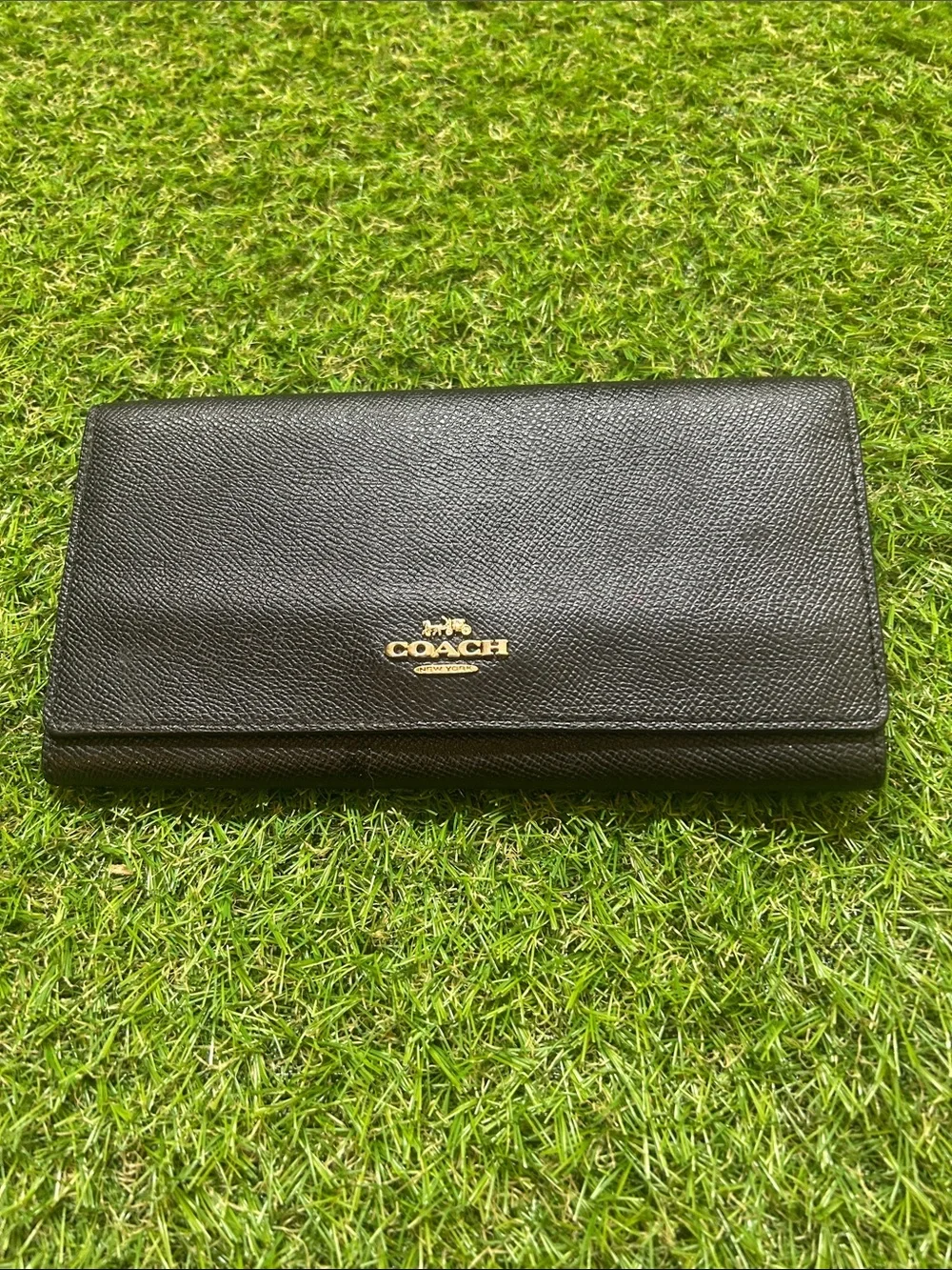 Coach Black Pebbled Leather Fold Wallet with Gold Emblem